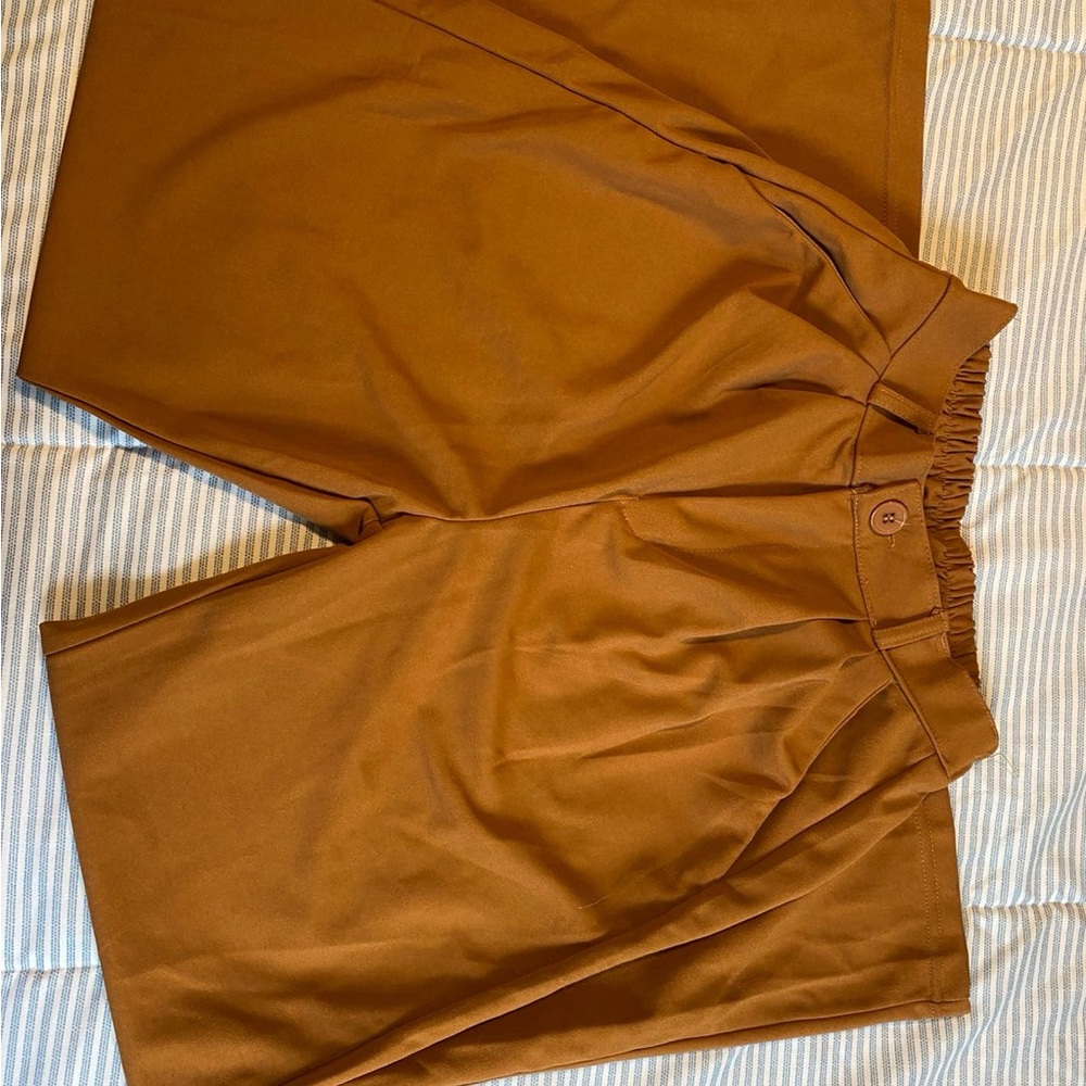 No brand pants. Flowy new without tag.